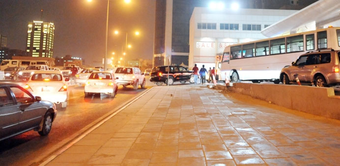  tA long queue of vehicles at a petrol station in Doha. PICTURE: Najeer Feroke