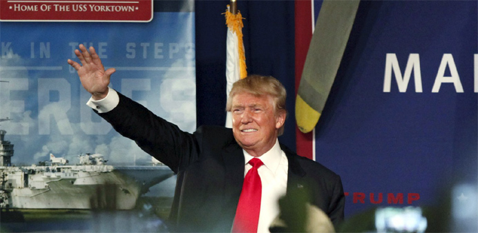 US Republican presidential candidate Donald Trump waves to the crowd