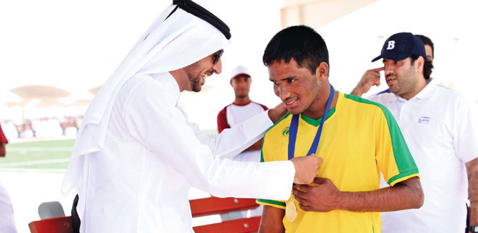 Prizes being distributed at the end of the sporting event.