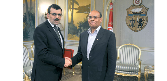 Tunisian President Moncef Marzouki (right) with Ali Larayedh in Tunis.