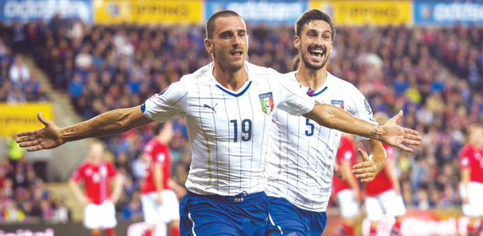 Italian defender Leonardo Bonucci (left) celebrates after scoring against Norway during the UEFA Euro 2016 Group H qualifying match in Oslo. (AFP)