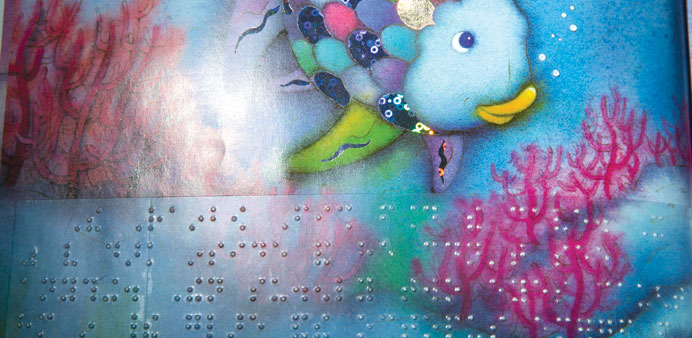 Inmates transcribed a Braille overlay on the popular childrenu2019s book The Rainbow Fish so a blind person can read along with a sighted person, at the O