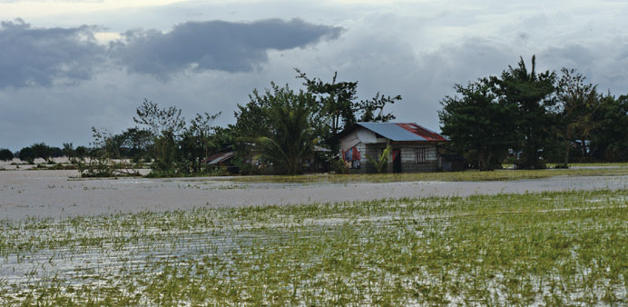 A recent photo shows submerged houses and a rice field due to heavy rains brought about by typhoon Koppu, in Jaen town, Nueva Ecija province north of 
