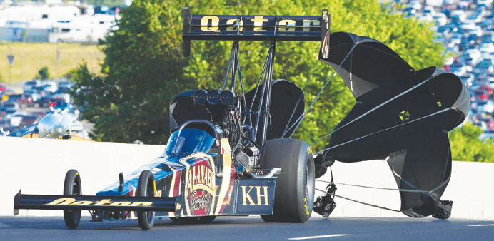 Khalid al-Balooshi deploys the parachutes to slow his dragster following a successful run on the mountain-top race track in Denver, Colorado last week