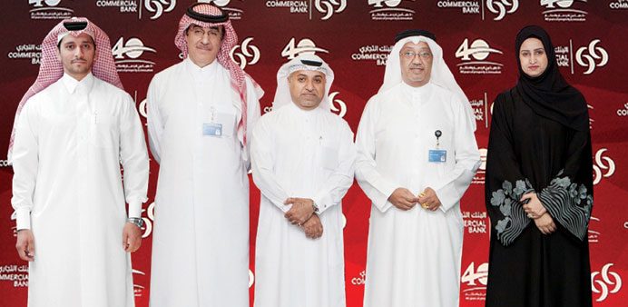 Commercial Bank CEO Abdulla Saleh al-Raisi with members of the executive committee.