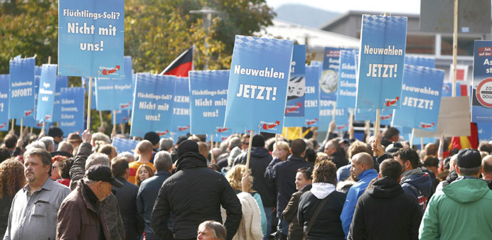 Supporters of the right-wing Alternative for Germany (AfD) party march as they demonstrate against the German governmentu2019s new policy for migrants, in