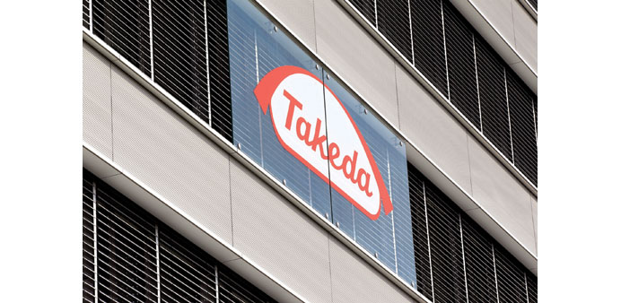 The logo of Takeda is seen at an office building in Glattbrugg near Zurich. The Japanese drugmaker has spent at least $20bn on acquisitions in recent 