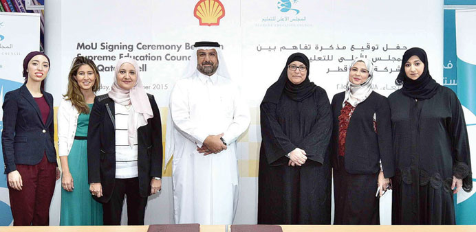 SEC and Qatar Shell officials at the signing ceremony.