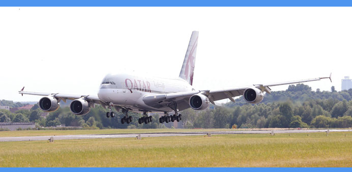 A Qatar Airwaysu2019 Airbus A380 aircraft lands at the Paris Airshow.