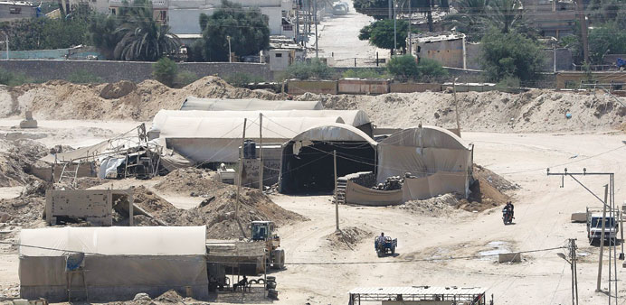 Tents cover the entrance of tunnels along the border between the Gaza Strip and Egypt, in Rafah yesterday.