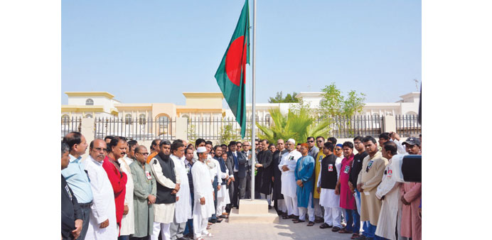 The Bangladesh ambassador hoisting the national flag on the National Mourning Day at the embassy yesterday.