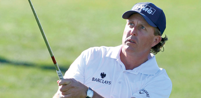 Phil Mickelson watches his second shot on the ninth hole during the second round of the Waste Management Phoenix Open at TPC Scottsdale on Friday in S