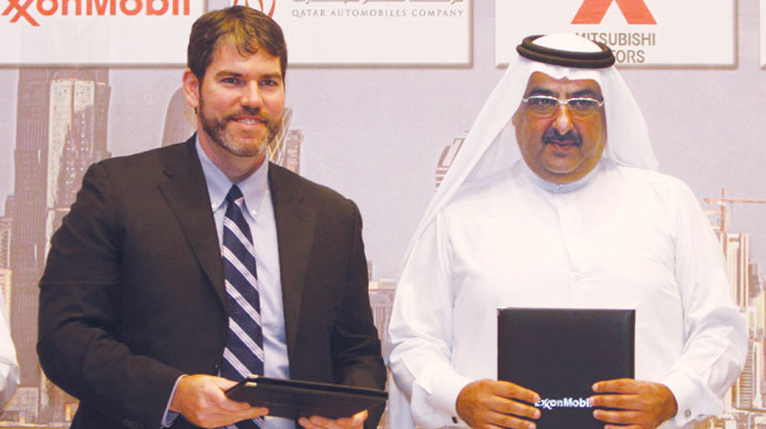 ExxonMobil Qatar Inc president and general manager Bart Cahir (left) and Qatar Cycling Federation president Sheikh Khalid bin Ali al-Thani are seen af