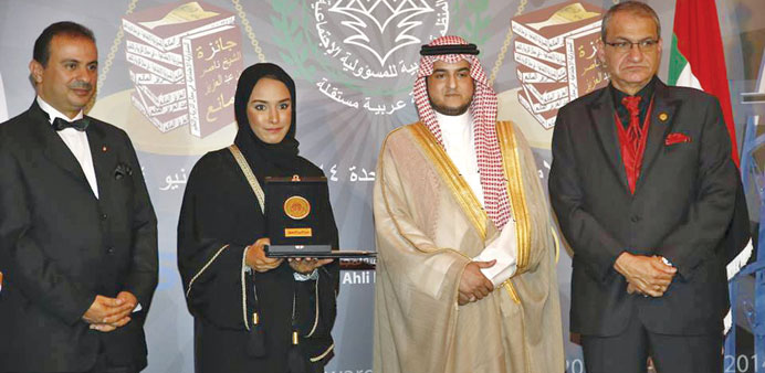 Dana Haidan, head of CSR, Vodafone Qatar with the award.
