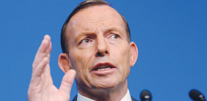 Australian Prime Minister Tony Abbott gestures during a press conference in Canberra yesterday.
