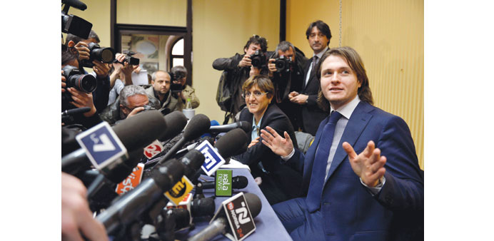 Sollecito gestures as he speaks, flanked by his lawyer Giulia Bongiorno, at a press conference in Rome yesterday.