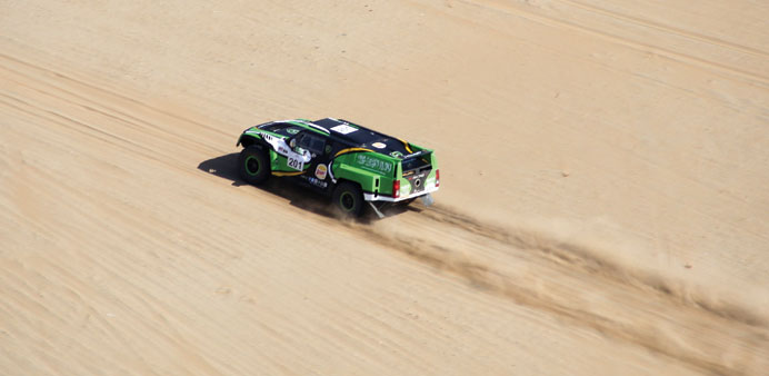Yazeed al-Rajhi crosses the Saudi wilderness on his way to winning Rally Jeddah in 2014.