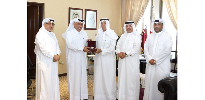 QRC and Al Darwish United Group officials.