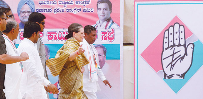 Congress president Sonia Gandhi gestures as she arrives to attend a campaign rally in Kolar, around 62km from Bangalore, yesterday.