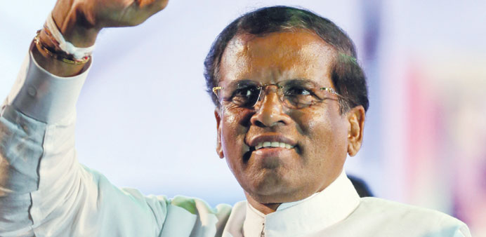 Maithripala Sirisena waves to a crowd during an election campaign rally in Kalutara, some 45km south of Colombo, in January.