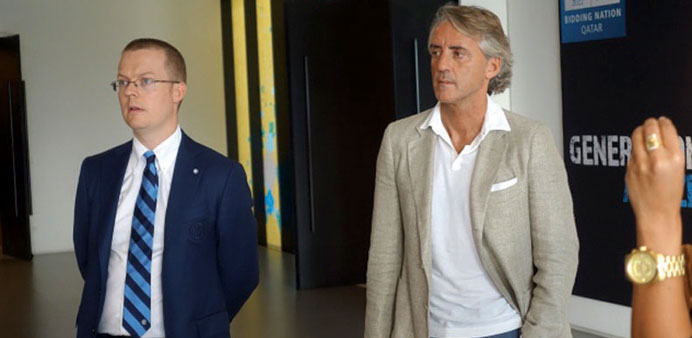  Roberto Mancini (right) during his visit to Doha recently.
