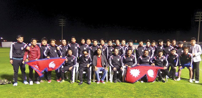 TOGETHER: The Nepal community football team before the match. 