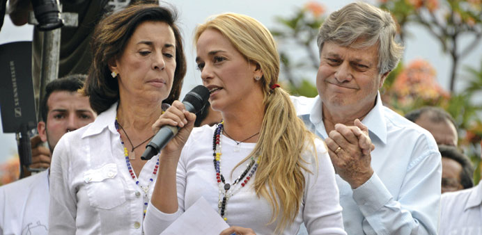 Lilian Tintori, the wife of arrested opposition leader Leopoldo Lopez, takes part in a rally in Caracas on Friday.