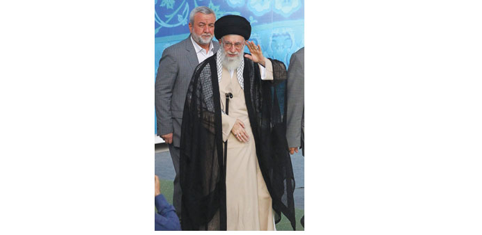 Ayatollah Ali Khamenei arrives for the Eid al-Fitr prayers in Tehran yesterday.