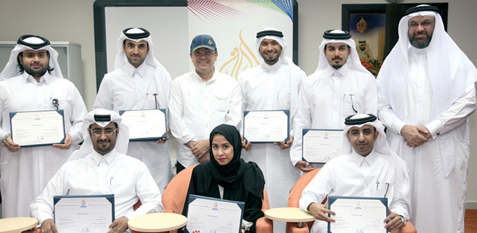 A group of participants with their certificates.