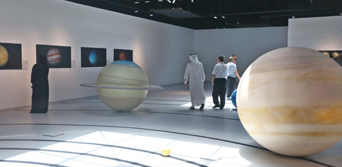 Models of the different planets being displayed at the exhibition.