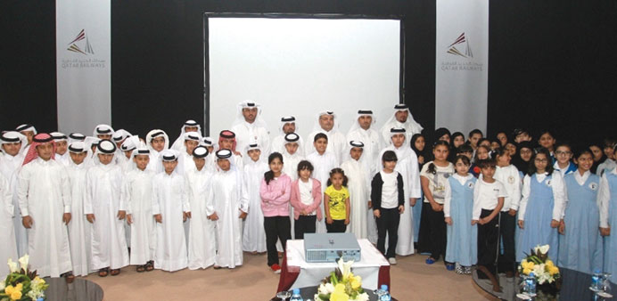 Officials with children at the launch of the event.