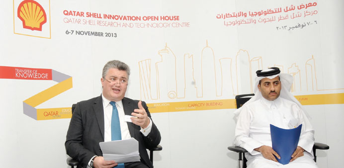    Shell Gas Technology vice president John MacArthur and QSRTC managing director Youssef Saleh addressing the media on the sidelines of the Open Hous