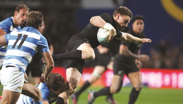 New Zealandu2019s flyhalf Beauden Barrett (R) is tackled during the Rugby Championship match against Argentina in Hamilton.
