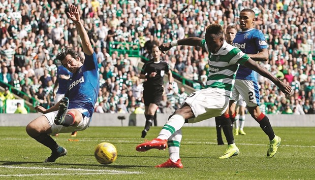 Celticu2019s Moussa Dembele scores against Rangers during the Scottish Premiership at  Celtic Park yesterday. (Reuters)