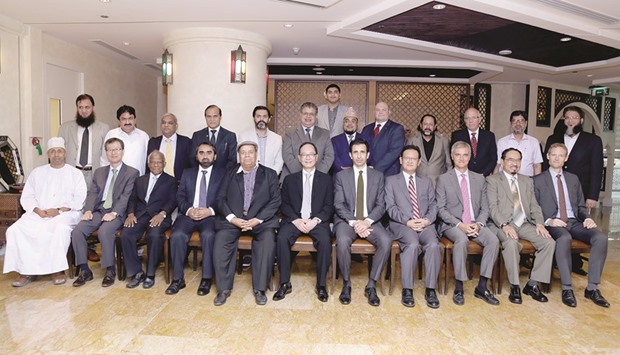 GROUP PHOTO: The Pakistani community members who hosted a lunch reception for the outgoing envoy.