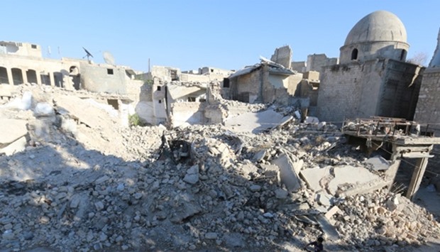 Rubble of damaged buildings in al-Maadi district of Aleppo