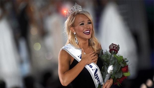 Miss Arkansas Savvy Shields, 21, reacts after winning the 96th Miss America Pageant at Boardwalk Hall in Atlantic City, New Jersey on Sunday.