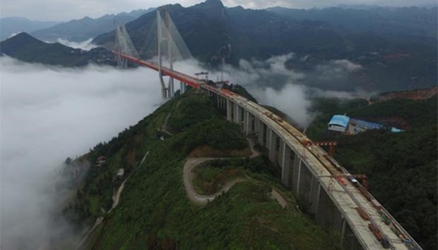 An aerial view of a bridge that will connect two provinces in Bijie, Guizhou province, China.