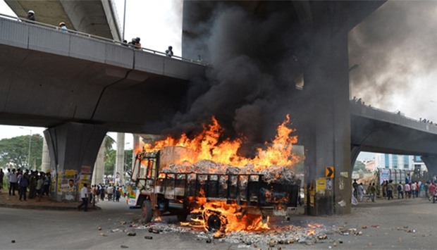 A truck from neighbouring state Tamil Nadu burns