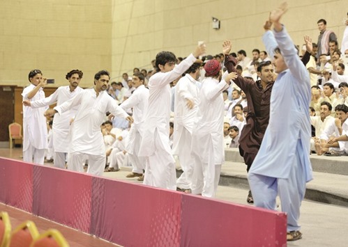 CELEBRATIONS: Members of the audience performing the traditional Attan dance.     Photos by Umer Nangiana