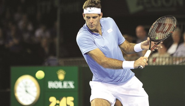 Argentinau2019s Juan Martin del Potro returns to Britainu2019s Andy Murray (below) during the Davis Cup World Group semi-final singles match in Glasgow, Scotland, yesterday. (AFP)