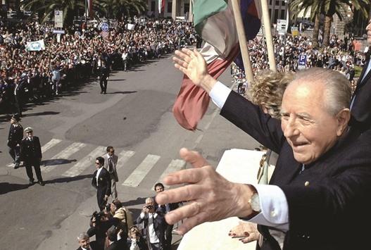 Ciampi waving to the crowd during a visit to his hometown of Livorno on May 3, 2006.