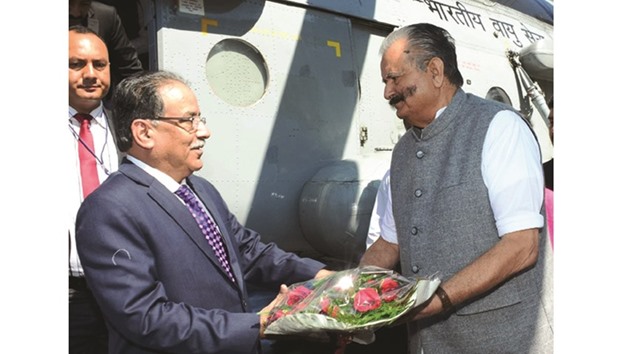 Nepal Prime Minister Pushpa Kamal Dahal being welcomed by Himachal Pradesh Power Minister Sujan Singh Pathania at Jhakri near Rampur in Shimla district of Himachal Pradesh yesterday.