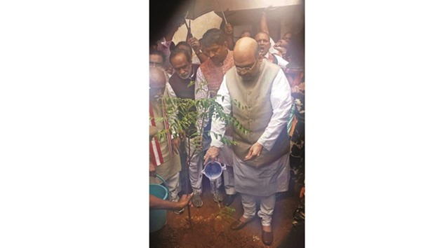 Bharatiya Janata Party chief Amit Shah plants a sapling at the party office in Hyderabad yesterday. Shah was in Hyderabad to take part in celebrations marking the Hyderabad merger day.