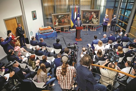 Dutch Ambassador to Ukraine Kees Klompenhouwer takes part in a ceremony in Kiev to mark the return of paintings that were stolen from the Netherlandsu2019 Westfries Museum in 2005 and discovered in Ukraine earlier this year.