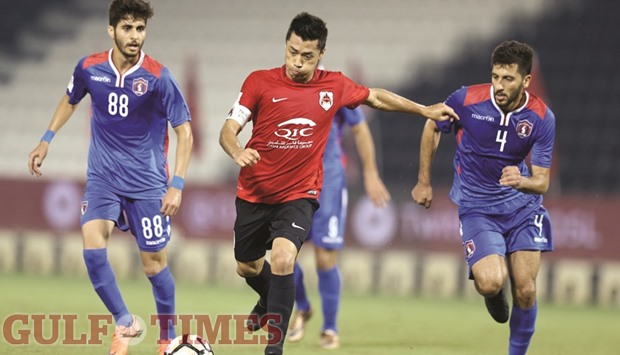 Al Rayyanu2019s Rodrigo Tabata (C) in action against Al Shahania in the Qatar Stars League yesterday.