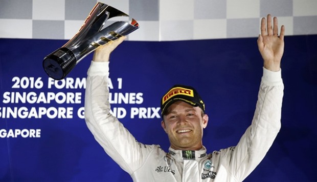 Mercedes' Nico Rosberg of Germany celebrates on the podium