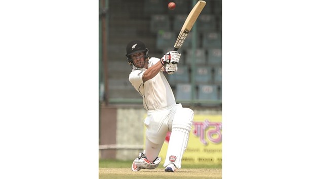 New Zealandu2019s Luke Ronchi plays a shot during a practice match against Mumbai at the Ferozshah Kotla ground in New Delhi. (AFP)