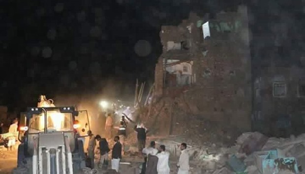 Around a dozen bombs or missiles hit the headquarters of the National Security Bureau in Sanaa's Old City, causing damage to neighbouring homes