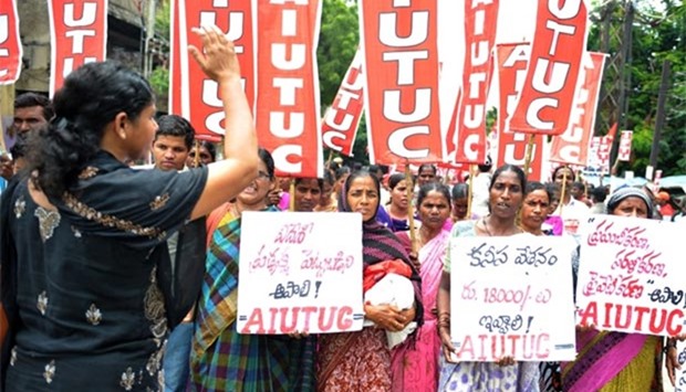 Members of the All India Trade Unions participate in a rally in support of a one-day countrywide strike, in Hyderabad on Friday.